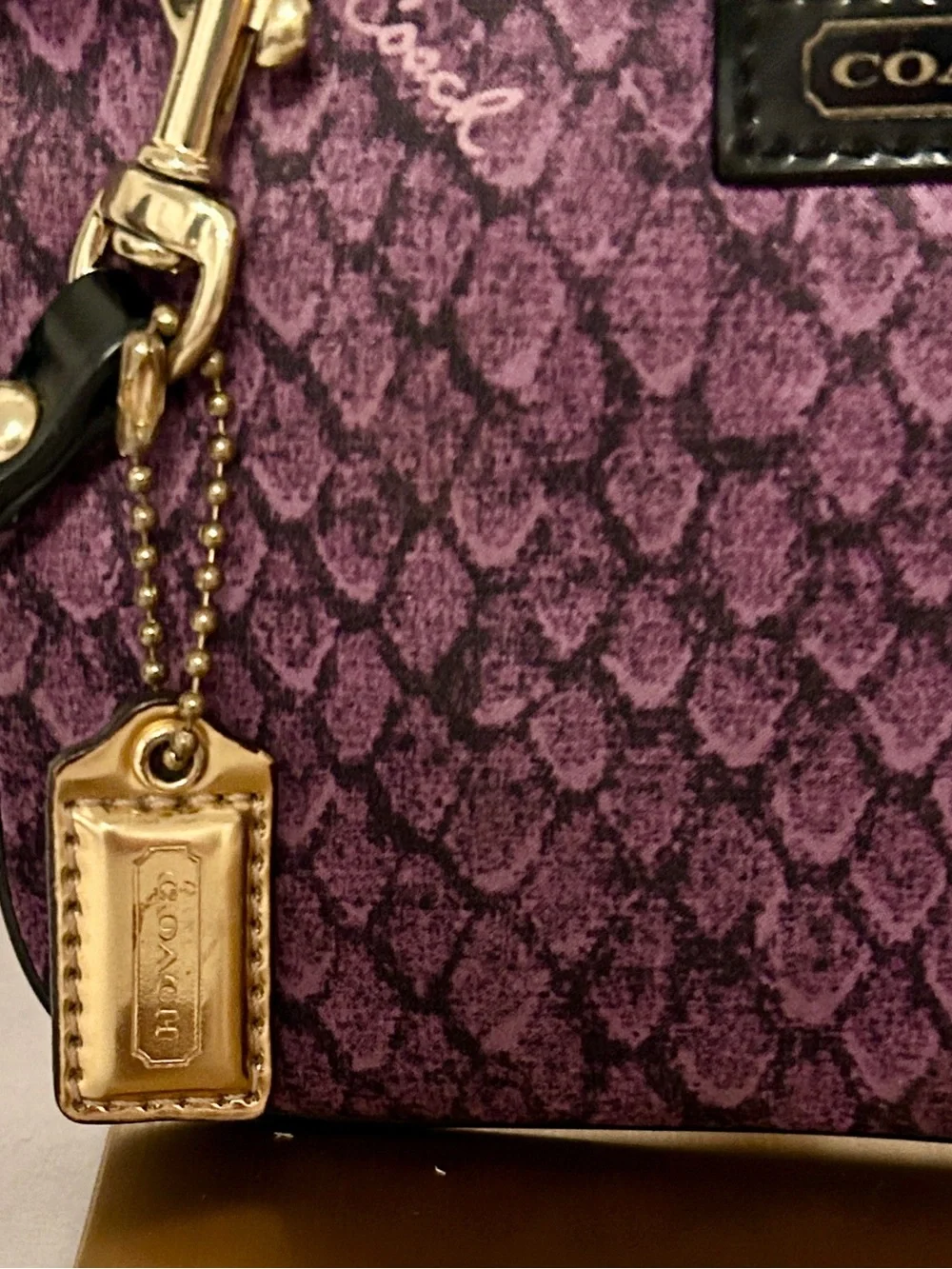 Coach Taylor Snake Print Satin Wristlet in purple and black